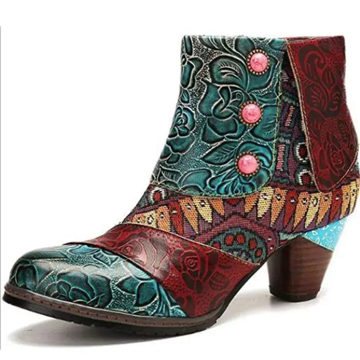 A colorful, patterned leather boot with a high heel and lace-up closure, showcasing ankle-length design.